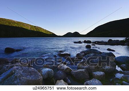 Rocks in Jordan Pond by hills in Acadia National Park, Maine, USA View Large Photo Image Stock Image - Rocks in Jordan Pond by hills in Acadia National Park, Maine, USA. Fotosearch