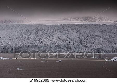 Stock Photography - Seascape with glacier and storm clouds, Skaftafell, Austur-Skaftafellssysla, Iceland. Fotosearch