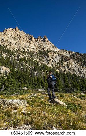 Senior man hiking on Sawtooth Mountains in Stanley, Idaho, USA View Large Photo Image Stock Photo - Senior man hiking on Sawtooth Mountains in Stanley, Idaho, USA. Fotosearch