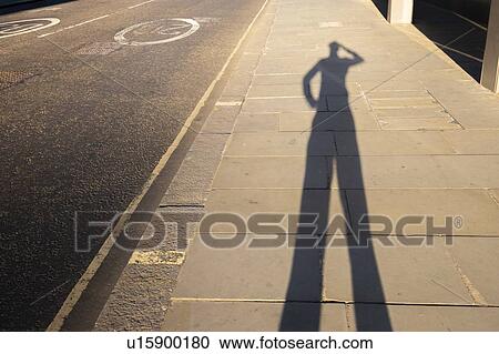 Stock Image - Shadow scratching head. Fotosearch