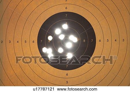 Shooting target with bullet holes View Large Photo Image Stock Image - Shooting target with bullet holes. Fotosearch
