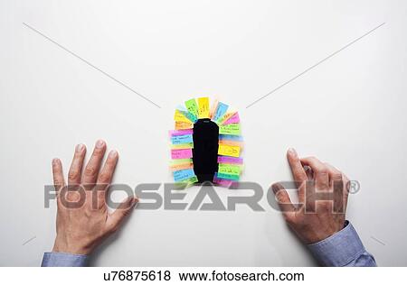 Stock Photo - Smartphone covered in sticky notes. Fotosearch