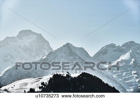 Snow covered mountain landscape with ski slope, Alpe-d'Huez, Rhone-Alpes, France View Large Photo Image Stock Image - Snow covered mountain landscape with ski slope, Alpe-d'Huez, Rhone-Alpes, France. Fotosearch