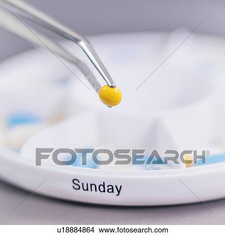 Picture - Sorting medications. Fotosearch