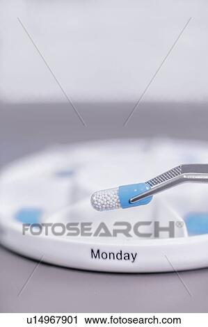 Sorting medications View Large Photo Image Stock Image - Sorting medications. Fotosearch