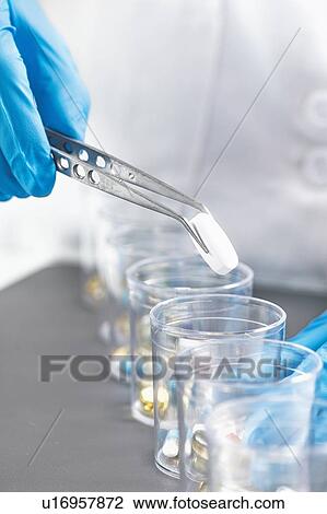 Stock Image - Sorting medications. Fotosearch