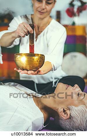 Picture - Sound healing meditation therapy. Fotosearch