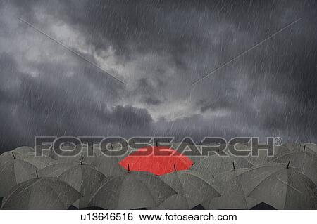 Stock Photograph - Standing out from the crowd, conceptual image. Fotosearch