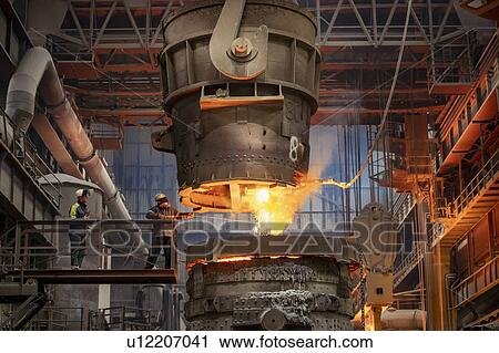 Steelworker starting molten steel pour in steelworks View Large Photo Image Stock Image - Steelworker starting molten steel pour in steelworks. Fotosearch