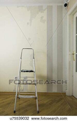 Step ladder by wall of torn wallpaper View Large Photo Image Stock Image - Step ladder by wall of torn wallpaper. Fotosearch