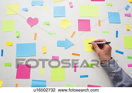 Sticky notes on a wall View Large Photo Image Stock Image - Sticky notes on a wall. Fotosearch