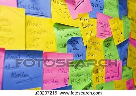 Stock Photography - Sticky notes on a wall. Fotosearch