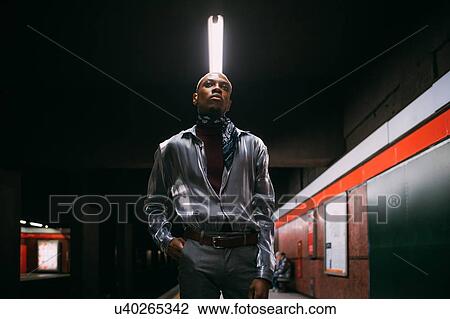 Stylish man on subway platform, Milan, Italy View Large Photo Image Stock Image - Stylish man on subway platform, Milan, Italy. Fotosearch