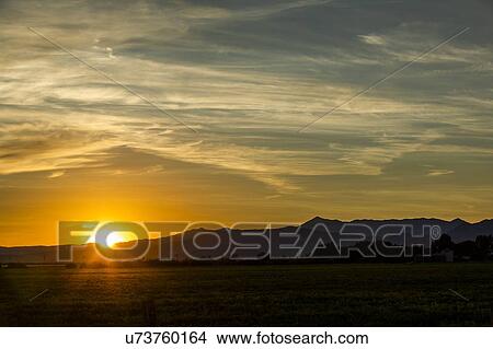 Sunset cloudscape in Picabo, Idaho, USA View Large Photo Image Picture - Sunset cloudscape in Picabo, Idaho, USA. Fotosearch
