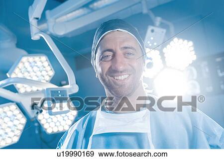 Stock Photo - Surgeon in operating theatre. Fotosearch