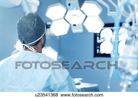 Stock Photo - Surgeon in operating theatre. Fotosearch