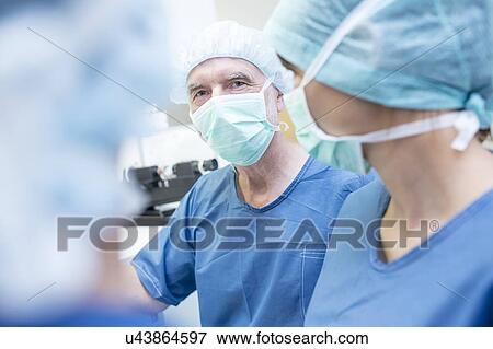 Stock Photo - Surgical team. Fotosearch