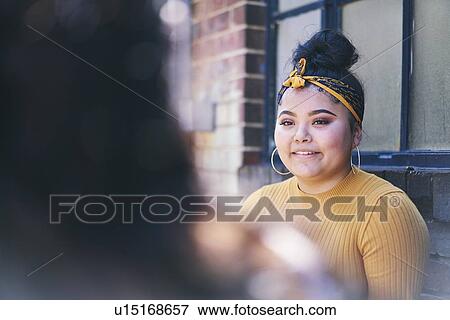 Teenage girl standing in doorway, over shoulder view View Large Photo Image Stock Photo - Teenage girl standing in doorway, over shoulder view. Fotosearch