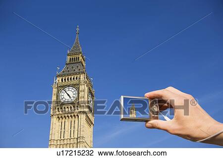 Tourist photographing Elizabeth Tower, London, UK View Large Photo Image Stock Image - Tourist photographing Elizabeth Tower, London, UK. Fotosearch