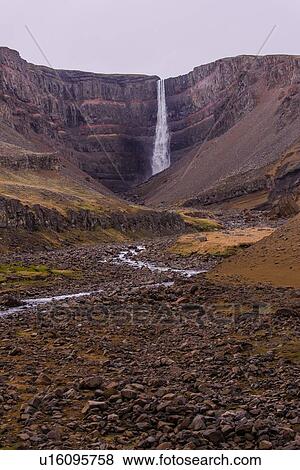 Valley landscape with rock formation waterfall, Hofn, Austur-Skaftafellssysla, Iceland View Large Photo Image Stock Photo - Valley landscape with rock formation waterfall, Hofn, Austur-Skaftafellssysla, Iceland. Fotosearch