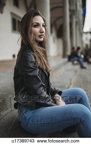 Woman daydreaming on steps View Large Photo Image Stock Image - Woman daydreaming on steps. Fotosearch