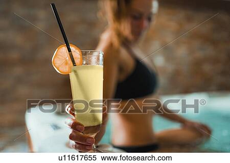 Woman enjoying hot tub in a spa View Large Photo Image Stock Photography - Woman enjoying hot tub in a spa. Fotosearch