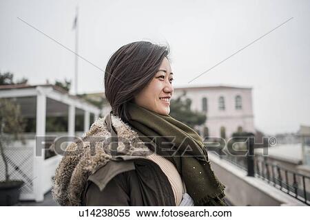 Stock Photography - Woman exploring Topkapi Palace, Istanbul, Turkey. Fotosearch