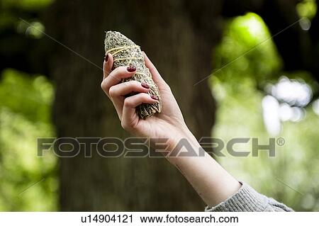 Woman holding healing stone for Reiki View Large Photo Image Stock Image - Woman holding healing stone for Reiki. Fotosearch
