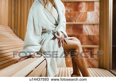 Stock Image - Woman in salt room. Fotosearch
