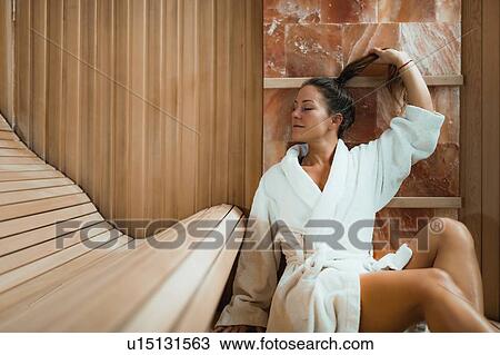 Stock Image - Woman in salt room. Fotosearch