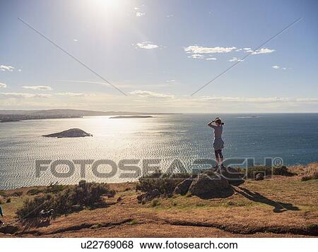 Woman looking at view of Victor Harbor, South Australia, Australia View Large Photo Image Stock Photo - Woman looking at view of Victor Harbor, South Australia, Australia. Fotosearch