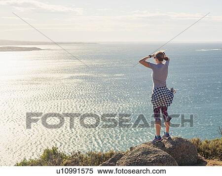 Woman looking at view of Victor Harbor, South Australia, Australia View Large Photo Image Stock Photography - Woman looking at view of Victor Harbor, South Australia, Australia. Fotosearch