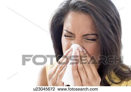 Woman sneezing View Large Photo Image Stock Image - Woman sneezing. Fotosearch
