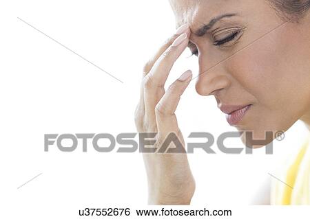 Woman touching her head in pain View Large Photo Image Stock Photograph - Woman touching her head in pain. Fotosearch