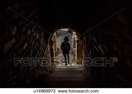 Woman walking down steps in stone building, Izmir, Turkey View Large Photo Image Stock Image - Woman walking down steps in stone building, Izmir, Turkey. Fotosearch