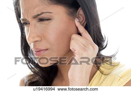 Woman with ear pain View Large Photo Image Picture - Woman with ear pain. Fotosearch