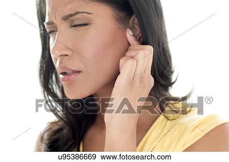 Woman with ear pain View Large Photo Image Stock Photo - Woman with ear pain. Fotosearch