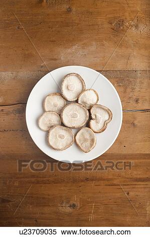 A plate of shiitake mushrooms (Lentinula edodes) View Large Photo Image Stock Photography - A plate of shiitake mushrooms (Lentinula edodes). Fotosearch