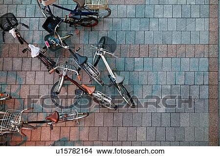 Aerial view of bicycles with nobody View Large Photo Image Picture - Aerial view of bicycles with nobody. Fotosearch
