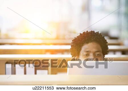 African American Man using computer in office with relaxing View Large Photo Image Stock Image - African American Man using computer in office with relaxing. Fotosearch