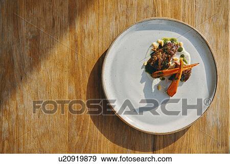 Appetizer dish on wooden table View Large Photo Image Stock Photo - Appetizer dish on wooden table. Fotosearch