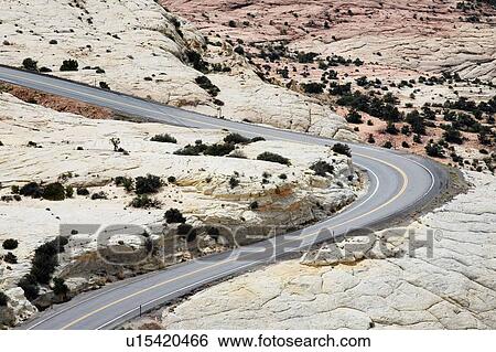 Stock Photograph - Arid winding desert motorway highway. Fotosearch