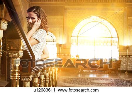 Attractive Brunette Woman Telephoning in Hotel Lobby View Large Photo Image Stock Image - Attractive Brunette Woman Telephoning in Hotel Lobby. Fotosearch