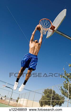 Baller Going Up for Slam Dunk View Large Photo Image Stock Photo - Baller Going Up for Slam Dunk. Fotosearch