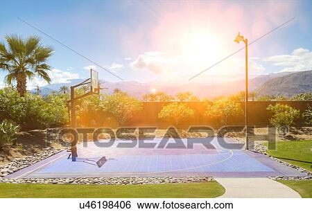 Basketball court in hot sunshine View Large Photo Image Stock Photograph - Basketball court in hot sunshine. Fotosearch