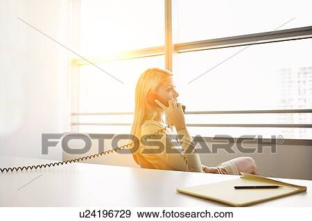 Beautiful blonde woman from home View Large Photo Image Stock Photo - Beautiful blonde woman from home. Fotosearch