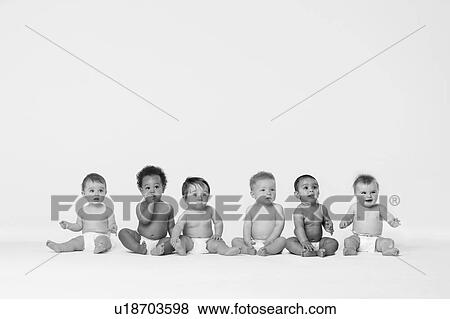 Black and white photo of Row of six multi ethnic Babies smiling in studio View Large Photo Image Stock Photo - Black and white photo of Row of six multi ethnic Babies smiling in studio. Fotosearch