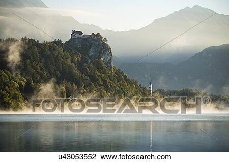 Bled Castle at dawn, Lake Bled, Upper Carniola, Slovenia View Large Photo Image Stock Image - Bled Castle at dawn, Lake Bled, Upper Carniola, Slovenia. Fotosearch