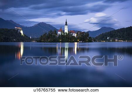 Bled Island with Church of the Assumption at dusk, Lake Bled, Upper Carniola, Slovenia View Large Photo Image Stock Photography - Bled Island with Church of the Assumption at dusk, Lake Bled, Upper Carniola, Slovenia. Fotosearch