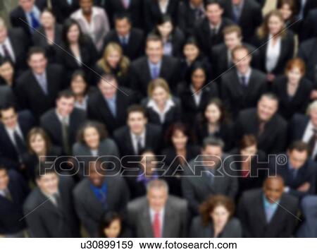Blurred photo of business group crowd View Large Photo Image Stock Photo - Blurred photo of business group crowd. Fotosearch